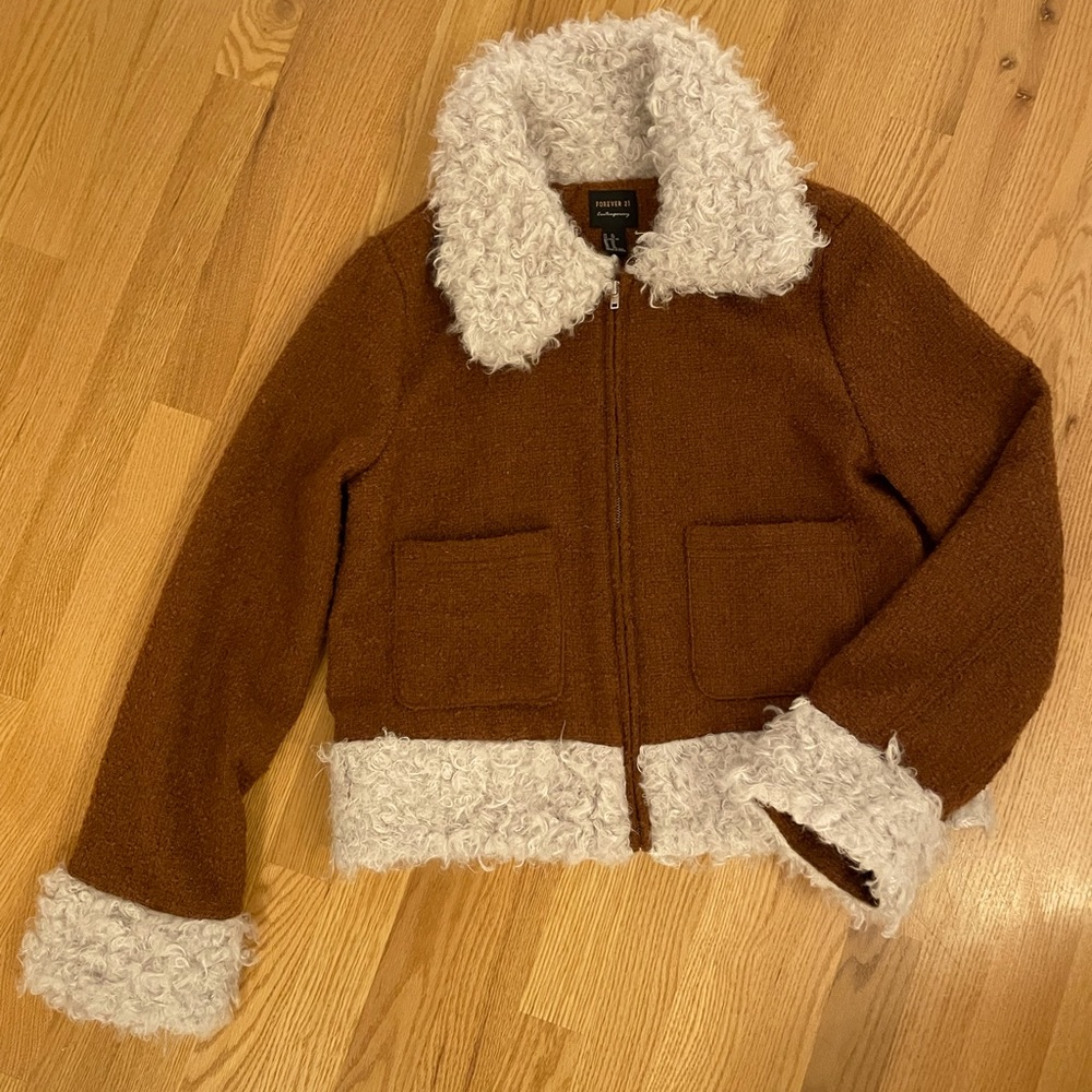 Faux fur collar rust colored jacket. Boucle, fully lined.